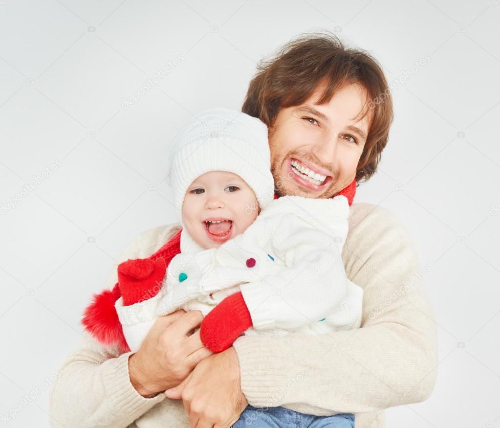happy family in winter. father dad playing with baby daughter