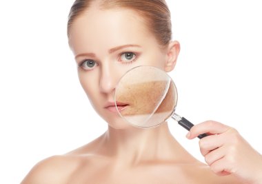 Concept skincare. Skin of beauty young woman with magnifier before and after the procedure