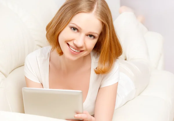 Happy woman with tablet pc at home — Stock Photo, Image