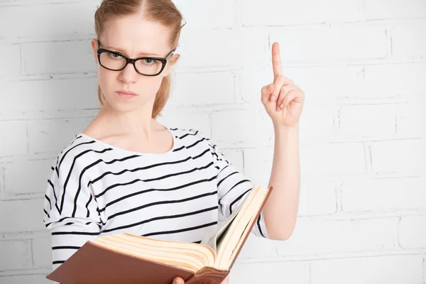 Angry strict serious teacher student with book — Stock Photo, Image