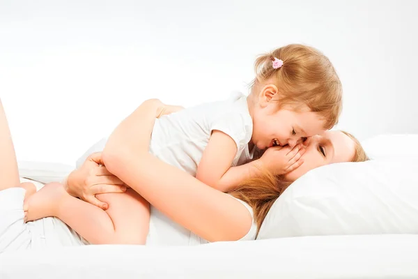 Happy family mother and baby daughter playing and laughing baby — Stock Photo, Image