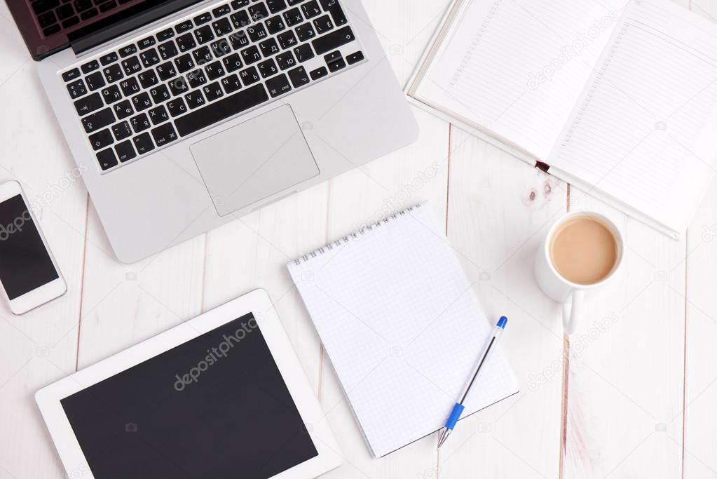 Workplace business. laptop, coffee, pen notebook