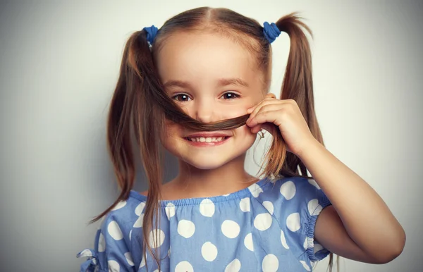 Happy face funny child girl in blue — Stock Photo, Image