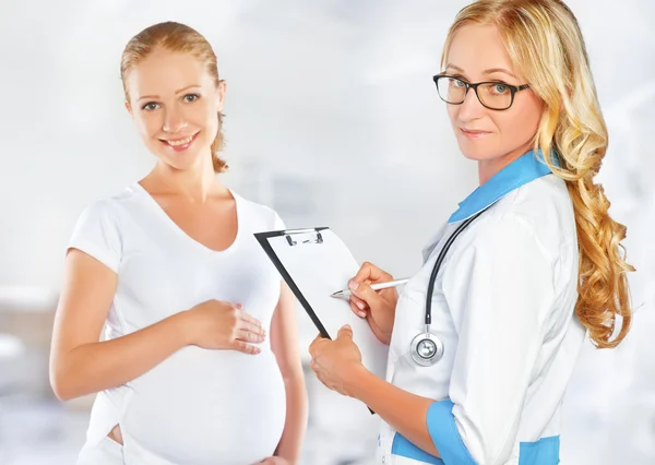 Pregnant woman on reception at doctor — Stock Photo, Image