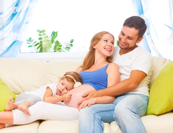 Happy family. pregnant mother, father, and child daughter at hom — Stock Photo, Image