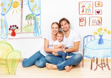 Concept : happy young family in  new apartment dream and plan in clipart