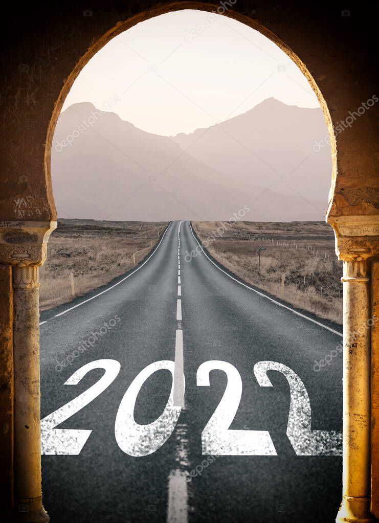 2022 New Year road trip travel and future vision concept view through the arch entrance