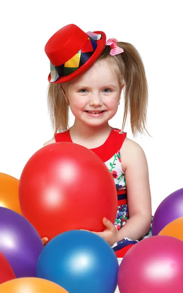 Retrato de uma menina brincando com bolas — Fotografia de Stock