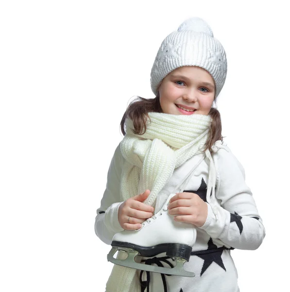 Portrait d'une petite fille tenant des patins à glace — Photo