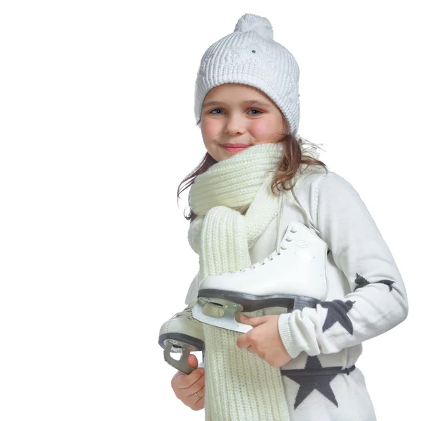 Portréja egy kislány gazdaság jég-korcsolya Stock Fotó