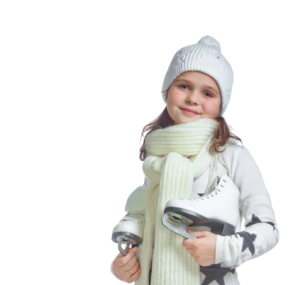 Retrato de una niña sosteniendo patines de hielo Imágenes de stock libres de derechos