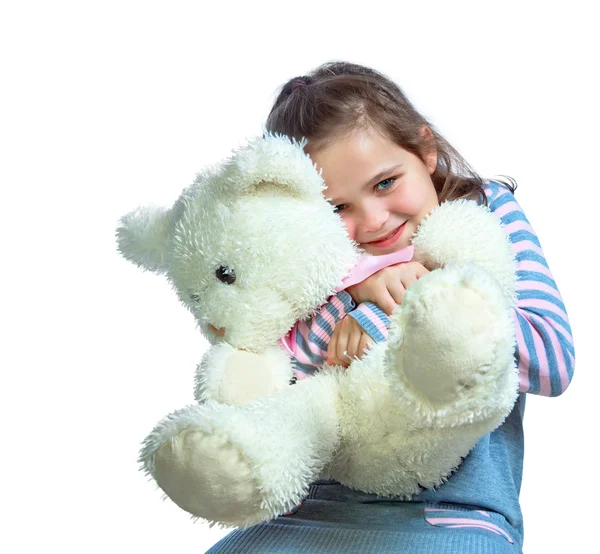 Portrait of a girl keep a bear on a white background — Stock Photo, Image