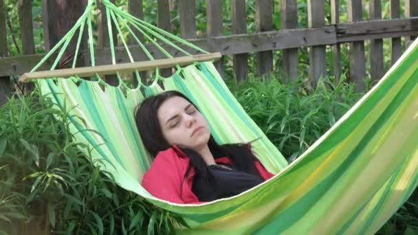 Girl asleep in hammock — Stock Video