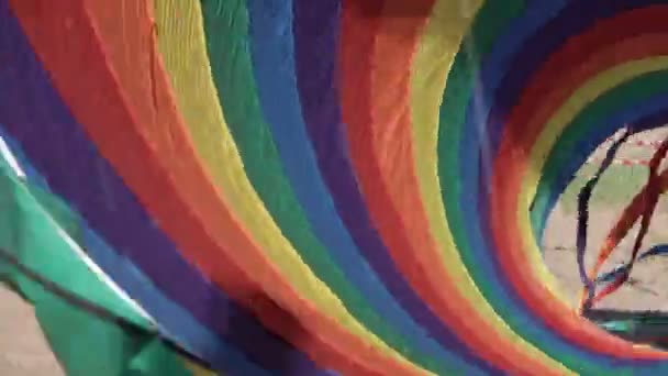 Floating multi-colored parachute — Stock Video