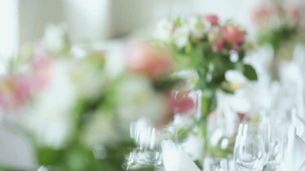 Table decorated with flowers — Stock Video