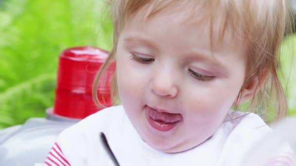 Year-old girl sitting on motorcycle — Stock Video