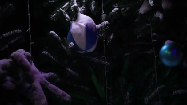 Illumination on Christmas tree CU — Stock Video