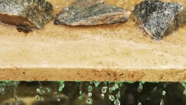 Granite slab with stones and water — Stock Video