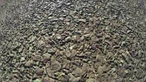 Superficie del camino con piedras — Vídeo de stock