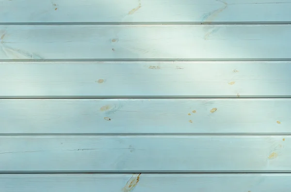 Buiten hout LD muur met de plekjes van zonlicht — Stockfoto