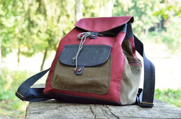 Handmade jean backpack outdoors — Stock Photo, Image