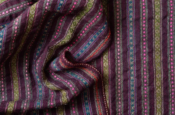 Close-up of the homespun woolen wrinkled