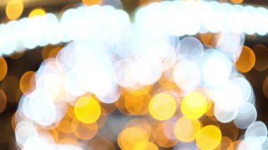 Yanıp sönen ışıklar arka plan, kış tatilleri. Kavram. Bulanık Noel ağacı ışıklarının parıltısını kapat. 