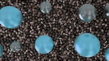 Toplar yığını, çocuklar için soyut havuz. Animasyon. Plastik kürelerin aşağı düşüşünün ve diğer küçük toplarla karışmasının üst görüntüsü kürelerin altından çıkan yuvarlak şekilli çelik figür..