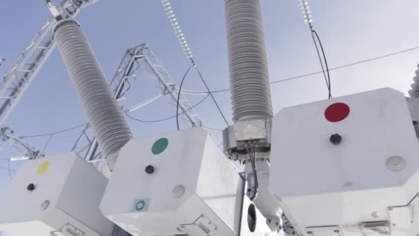 High voltage transformer at the power station. Action. Power generation systems connected to the city, important technology of electricity. — Stock Video