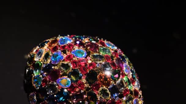Lot of colorful crystals on isolated background. Concept. Close-up of multicolored shiny crystals combined into one shape. Museum specimen of variety of expensive stones in one item — Stock Video