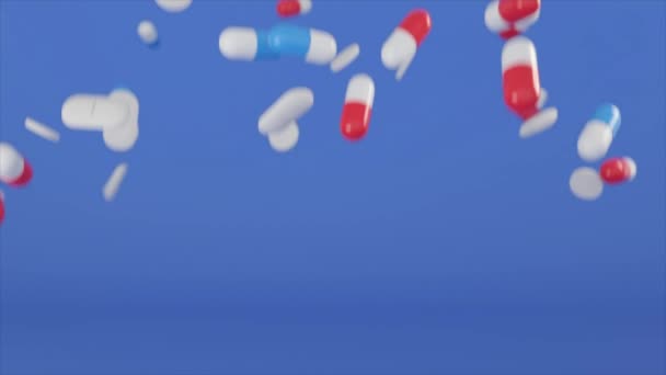 Gran cantidad de píldoras azules, blancas y rojas cayendo sobre un fondo azul. Animación. Concepto de salud, farmacología y medicina. — Vídeo de stock