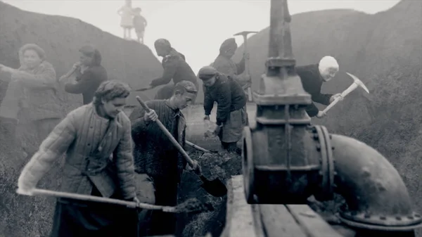 Russia - Volgograd, 04.12.2021: young men and women on historical retro photos, heroes of the Great Patriotic War. Stock footage. Strong and hardworking people during USSR times. — Stock Photo, Image