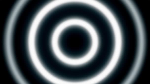 Anneaux néons hypnotiques sur fond noir. Animation. Animation en boucle avec effet hypnotique des anneaux mobiles. De simples cercles lumineux se déplacent et hypnotisent — Video