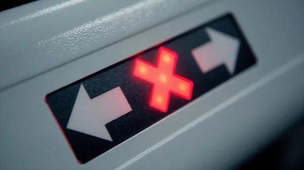 stock image Close up of automatic turnstile details with pass and stop signs. Video. Red glowing cross is changed by green arrow.