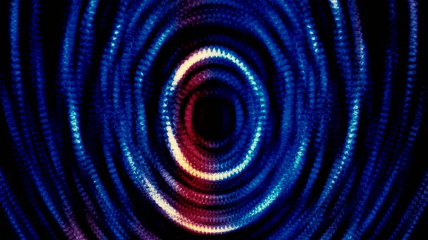 Soyut mavi ve kırmızı parlak parçacıklar derin tünelin halka ve etkilerini oluşturuyor. Hareket. Siyah arkaplanda daireler oluşturan renkli noktalar. — Stok fotoğraf