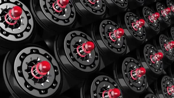 Futuristic technology with rows of spinning round shaped engines with red bulbs, seamless loop. Motion. Rotating space technology details on a black background. — Stock Video