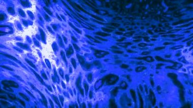 Hareket eden ve yanar döner bir sıvı. Hareket. Yanardöner benekli ve renkli 3 boyutlu sıvı. Plazma sıvısı hareket eder ve taşar