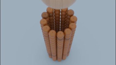 Küçük toplardan oluşan soyut kuleye düşen küreyi kapat ve onu yok et. Tasarım. Düşen yuvarlak şekilli nesneler.