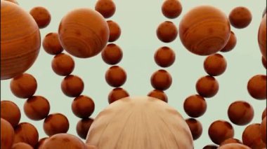 Tahta kahverengi kürenin kapağı küçük topların dağılmış figürünün içine düşüyor. Tasarım. Hareket eden ters etki ile yıkılan topların şekli.