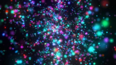 Soyut renkli parlayan parçacıklar canlı, bulanık bir bokeh arkaplan yaratıyor