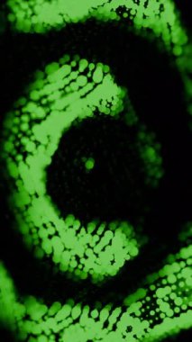 Abstract green circular particles rippling and pulsating on a dark background