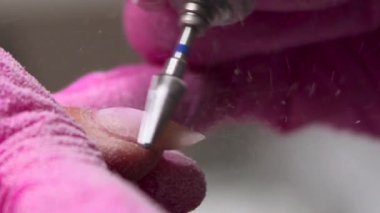 Tırnak Edge 'i döndürme aracı ve tozla düzleştirme, teknisyen sabit eldivenli bahşiş profili. Medya