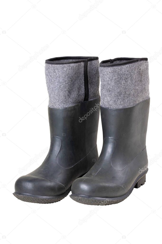 Rubber boots for production workers. Work clothes which workers working in the field are equipped with. Isolated background.