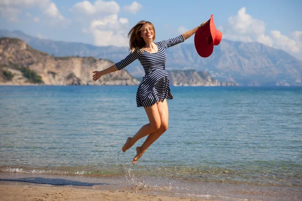 Resting woman on a beach — Stock Photo, Image