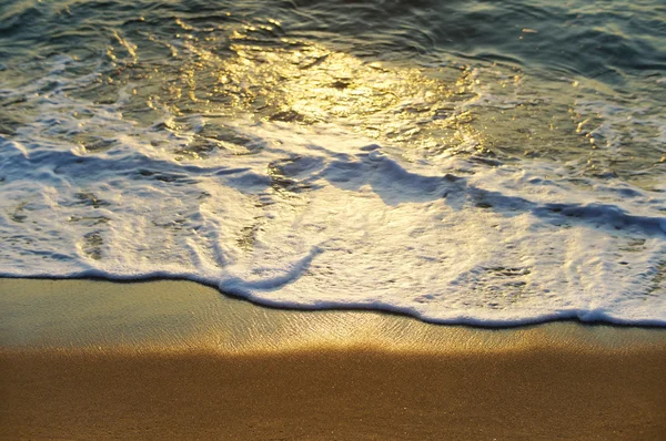 Gouden zee golven — Stockfoto