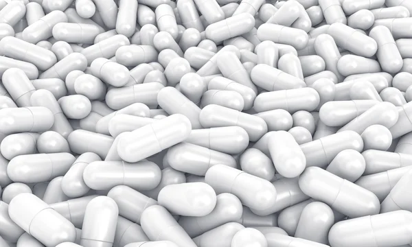 Many white pills — Stock Photo, Image