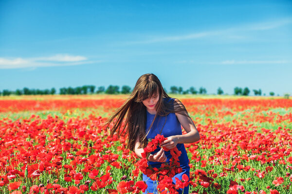 Girl with poppies