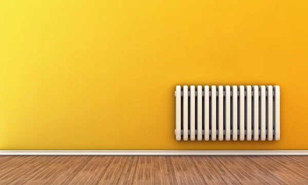 Radiator op een muur Stockfoto