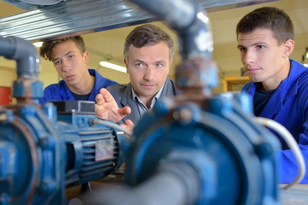 Lavoro macchina e tre — Foto Stock