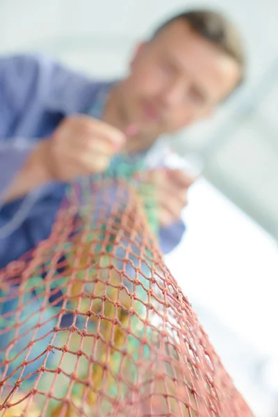 Man preparing net and blurry — Stock Image Man preparing net and blurry Royalty Free Stock Photos